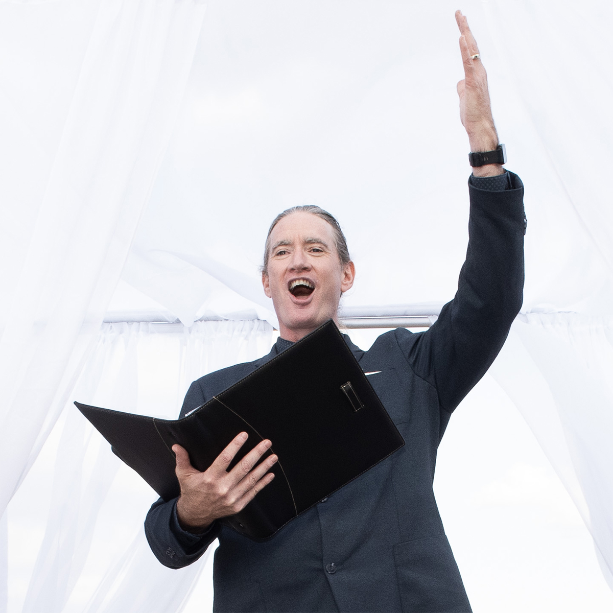 Rev. Michael Pronouncing the couple