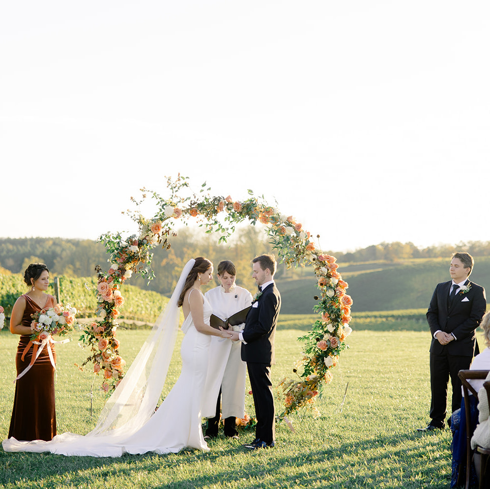 Rev. Laura Cannon officiating in Virginia at Stone Tower Winery Wedding