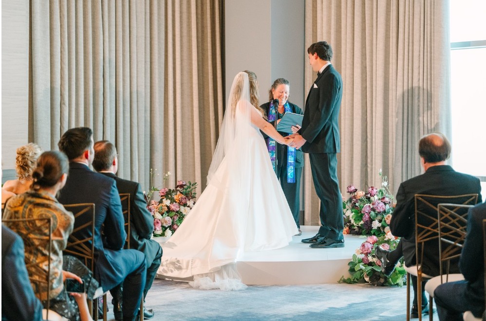 Rev. Kathy officiating for a couple at the Fairmont in Pittsburgh