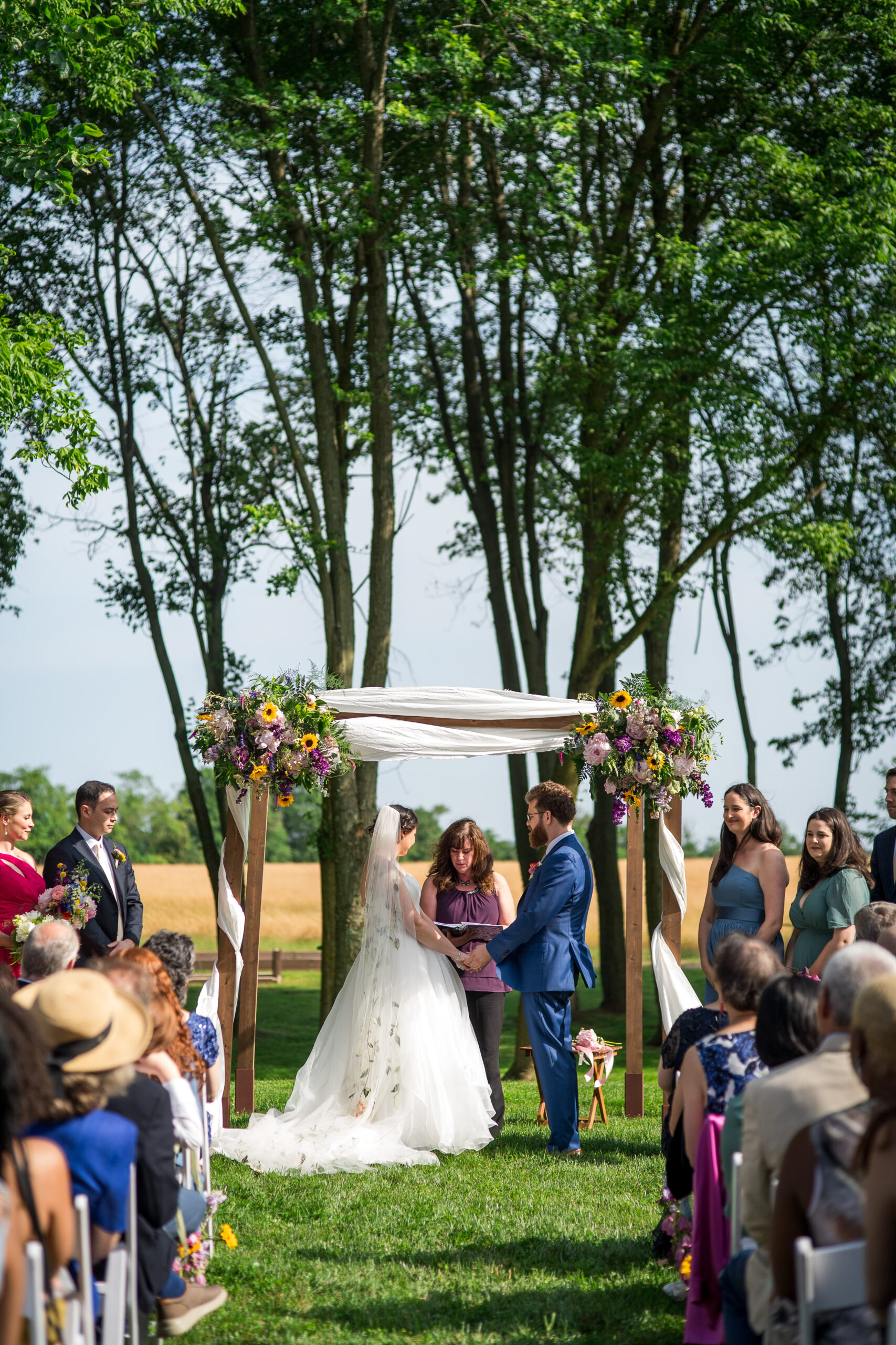 Rev Laura Starr Ramos officiating a wedding at Kent Island Resort