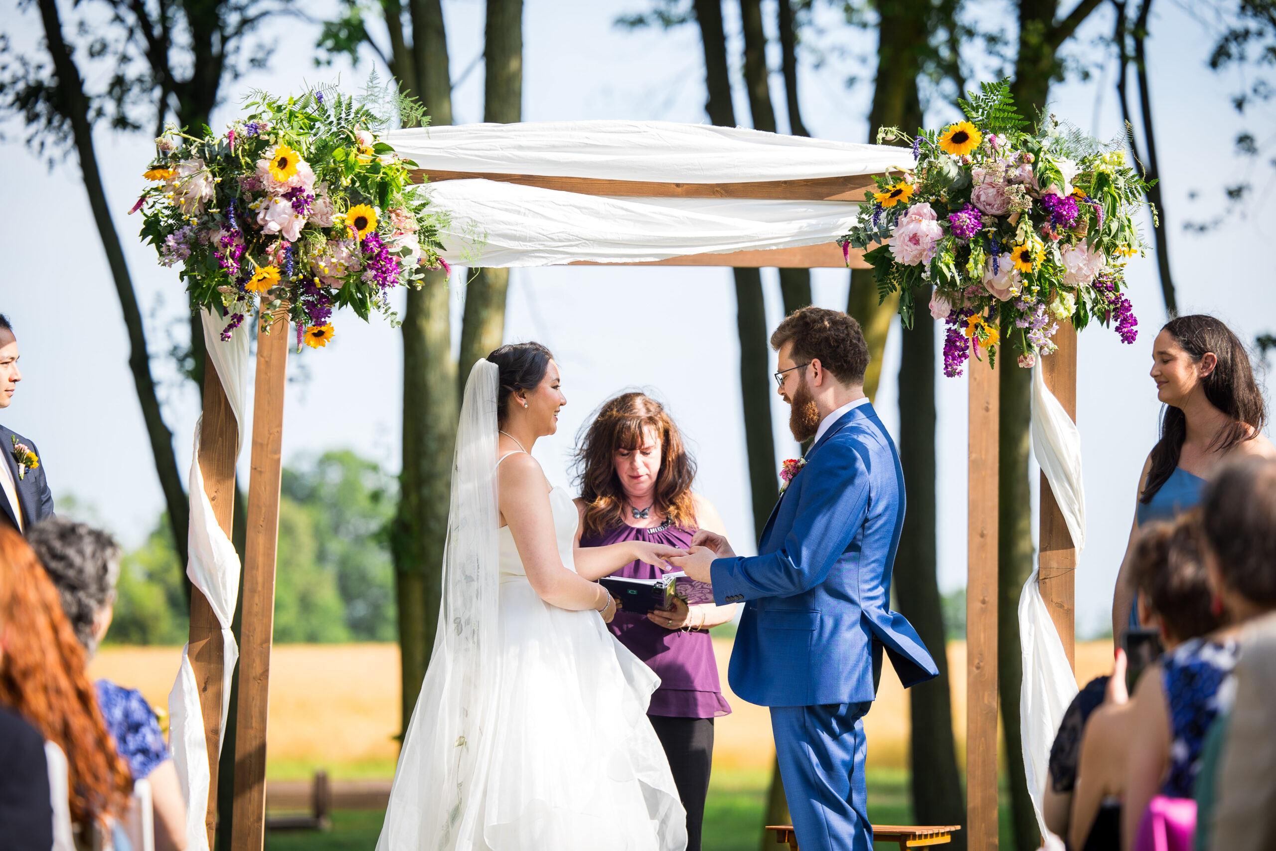 Rev Laura Starr Ramos officiating a wedding at Kent Island Resort