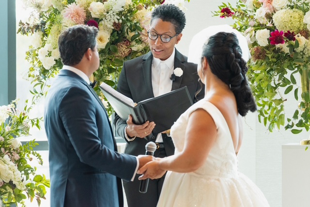 Rev. Kiana officiating at The Wharf